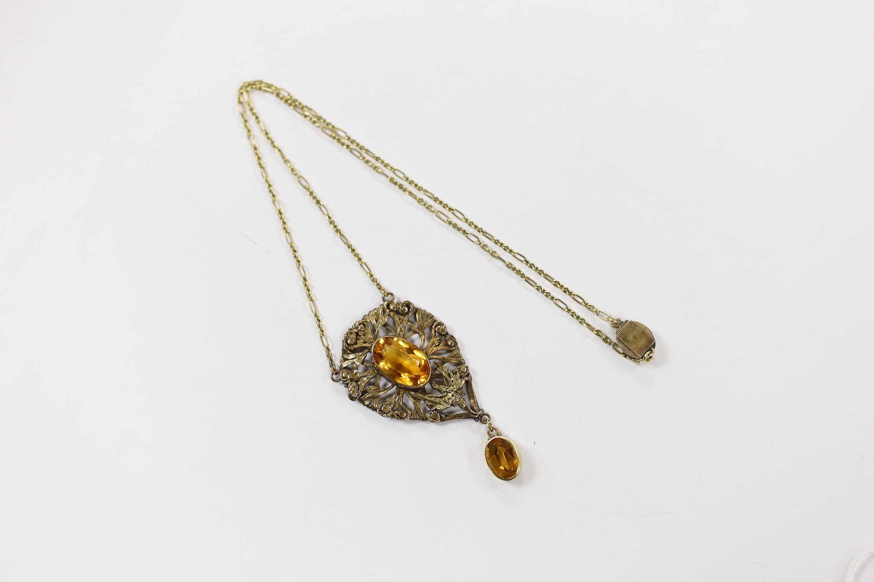 A yellow metal, white metal and two stone citrine set drop pendant necklace, with citrine set clasp, 58cm.